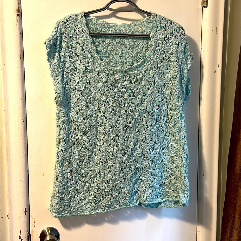 Hand made crochet top. Light blue ish turquoise with sparkles.PTP 23” long 25”